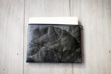 Load image into Gallery viewer, Sustainable 13–14 inch laptop sleeve made from recycled leaves in black-grey