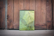 Laden des Bilds im Galerie-Viewer, Green laptop sleeve made from recycled leaves for 15–16 inch devices, front view