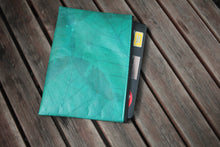 Charger l'image dans la galerie, Vegan laptop case made from recycled leaves on wooden table